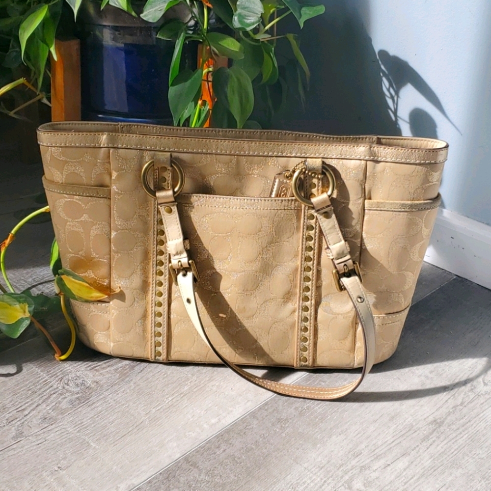 Golden metallic Coach handbag